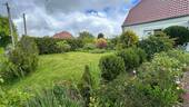 angelegter Garten - Einfamilienhaus mit 160,00 m&sup2; in Vorbeck zum Kaufen