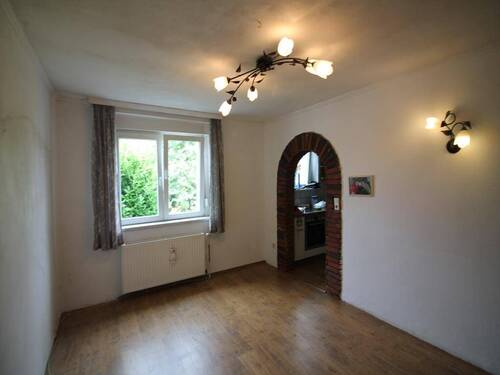 Wohnzimmer mit Blick zur Kueche - Mehrfamilienhaus, Wohnhaus mit 84,00 m² in Kamp-Lintfort zum Kaufen