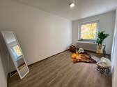 Wohnzimmer - 3 Zimmer Etagenwohnung in Königsbrunn