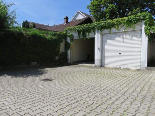 Duplex-Garage (links im Bild) - 4 Zimmer Etagenwohnung zum Kaufen in Kaufbeuren