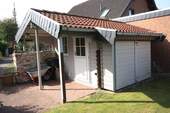 zweites Gartenhaus mit Holzlager - 