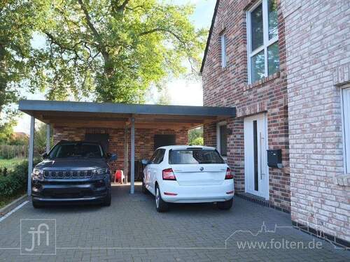 Carport-Stellplatz und Schuppen - 