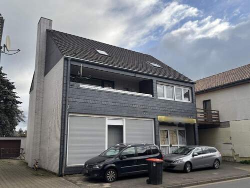 Straßenansicht - 6 Zimmer Mehrfamilienhaus, Wohnhaus zum Kaufen in Kamp-Lintfort