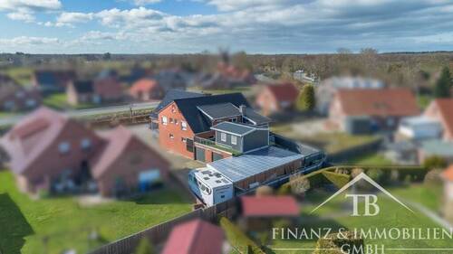Rückansicht (1) - Mehrfamilienhaus, Wohnhaus zum Kaufen in Großheide / Berumerfehn