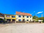 Gesamtansicht Haus+Garagen - Einfamilienhaus mit 215,20 m² in Torgau OT Staupitz zum Kaufen
