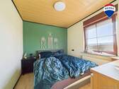 REMAX Immobilien DeLux Einfamilienhaus in Besseringen Schlafzimmer - 