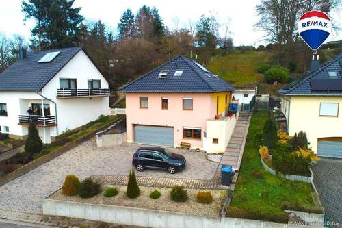 REMAX Immobilien DeLux Einfamilienhaus in Besseringen zu verkaufen - 8 Zimmer Einfamilienhaus zum Kaufen in Merzig