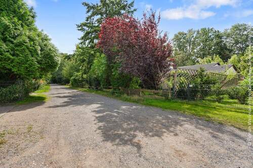 Straße vor dem Grundstück. - Grundstück in Buchholz zum Kaufen