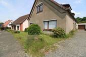 Vorderansicht 1.2 - 7 Zimmer Einfamilienhaus zum Kaufen in Geestland
