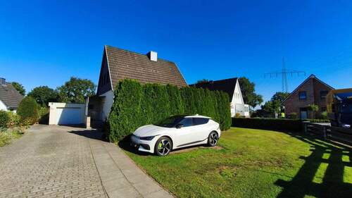 Ansicht - Wohnen mit Potenzial - Einfamilienhaus mit großem Baugrundstück in Haseldorf