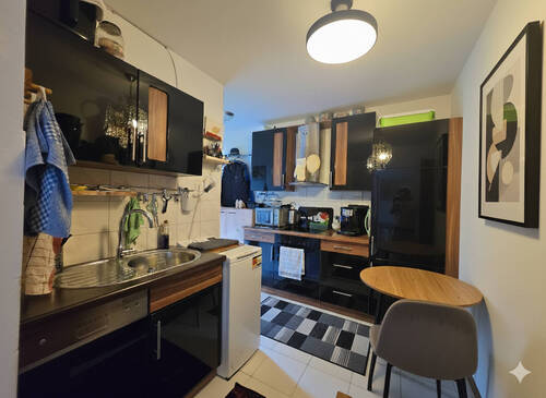 Moderne Küche im Wohnflur - 1 Zimmer Etagenwohnung zum Kaufen in München / Ramersdorf-Perlach