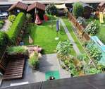 Blick vom Balkon in den Garten - 