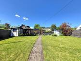Blick in den Garten - Einfamilienhaus mit 67,70 m&sup2; in Bernkastel-Kues zum Kaufen