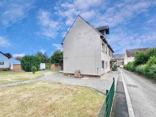 Seitenansicht - Einfamilienhaus mit 180,00 m² in Calden zum Kaufen