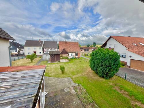 Ausblick Obergeschoss in den Garten - 