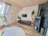 Wohnzimmer mit Kaminofen - 