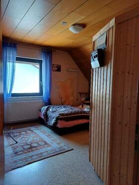 Zimmer mit Sauna und Ruhegelegenheit - 