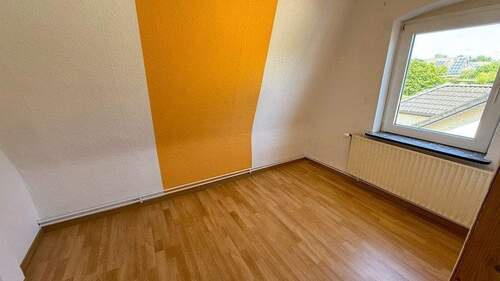 Zimmer im Dachgeschoss - 