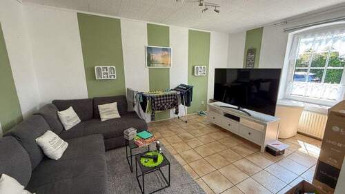 Wohnbereich - 6 Zimmer Einfamilienhaus zum Kaufen in Sörup