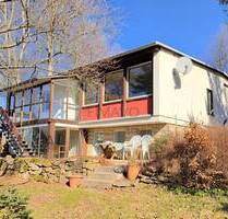 Einfamilienhaus mit großem Grundstück und Sanierungsbedarf in Boxdorf