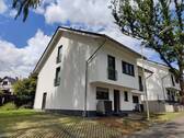 Hausansicht - Mehrfamilienhaus, Wohnhaus in Mehren zum Kaufen
