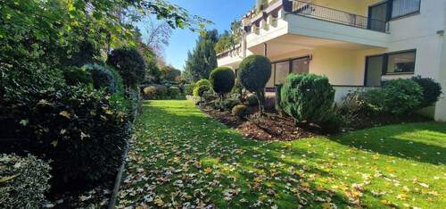 Garten mit Blick zur Terrasse - 4 Zimmer Terrassenwohnung in Köln (Eil)