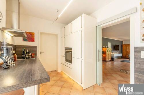 Küche zum Wohnzimmer - Einfamilienhaus mit 244,00 m² in Rimpar zum Kaufen