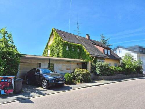 Ansicht - Charmantes Einfamilienhaus auf einem ca. 798 m² großen Grundstück zu verkaufen.