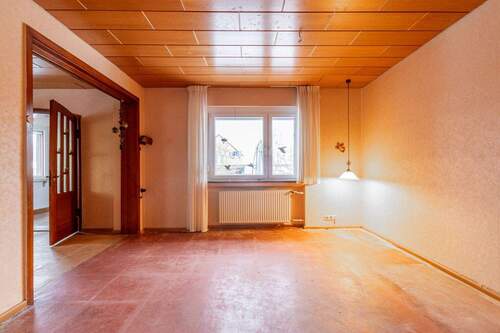 Wohnzimmer - EG - Einfamilienhaus mit 155,60 m&sup2; in Schwülper / Groß Schwülper zum Kaufen