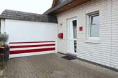 Carport mit elektrischem Tor - 
