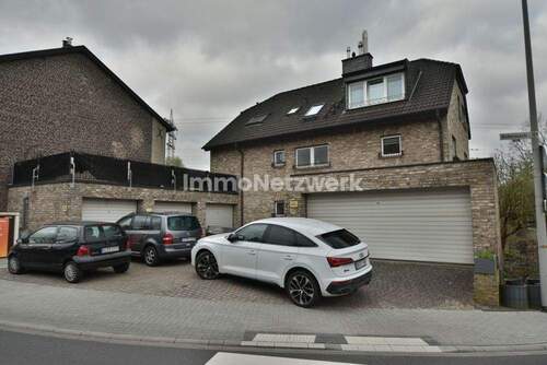 Haus & Garagen - 8 Zimmer Mehrfamilienhaus, Wohnhaus zum Kaufen in Herzogenrath / Merkstein
