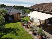 Gartenhaus u. Hochbeete - 