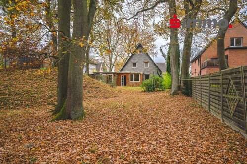Titelbild - Freistehendes Einfamilienhaus mit schönem Grundstück in beliebter, grüner Wohngegend
