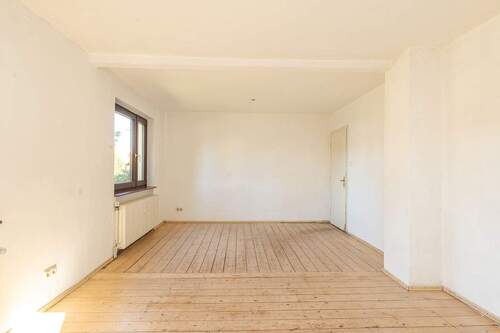 Wohnzimmer, vordere Wohneinheit - 