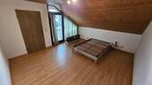 Schlafzimmer im Dachgeschoss - 