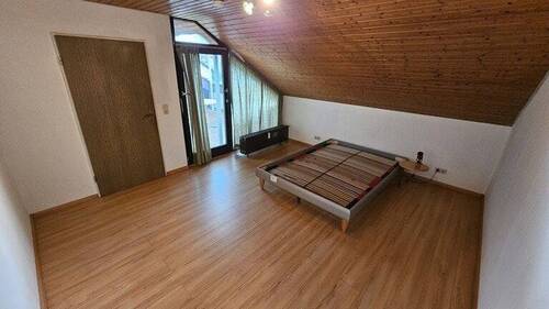 Schlafzimmer im Dachgeschoss - 