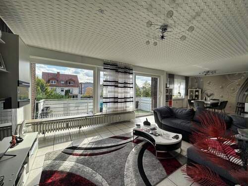 Wohnzimmer der Obergeschosswohnung - 