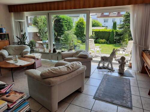 Wohnzimmer der Erdgeschosswohnung 2022 - 