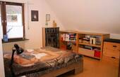 Schlafzimmer im Dachgeschoss - 