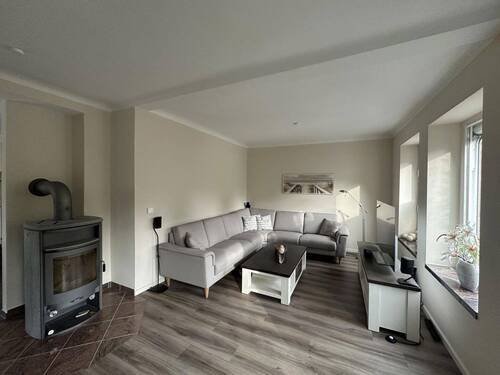 Wohnzimmer mit Kaminofen - 