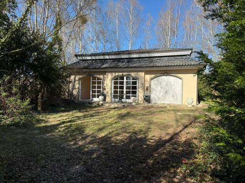 Ansicht - Michendorf: Freistehender Bungalow in ruhiger Wohngegend mit direktem Zugang zum Golfplatz, unweit Seddiner See!
