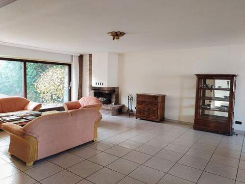 Wohnzimmer mit Kamin - 