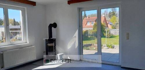 Wohnzimmer mit Kamin - 