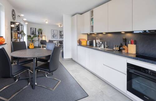 Essbereich mit Küche - 3 Zimmer Etagenwohnung in Alling