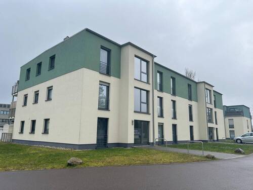 Haus Front - Etagenwohnung mit 78,00 m² in Bitterfeld-Wolfen zum Kaufen
