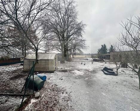 Gartenfläche und Nebengebäude - Einfamilienhaus mit 130,00 m&sup2; in Baruth/Mark zum Kaufen
