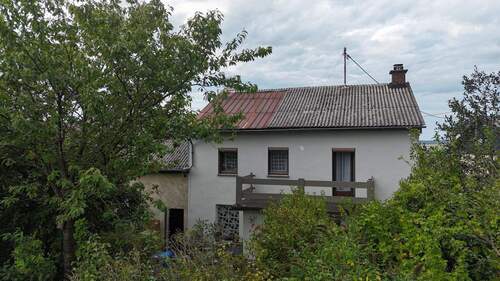 Hausrückseite - Einfamilienhaus mit schönem Gartengrundstück in idyllischer Lage.