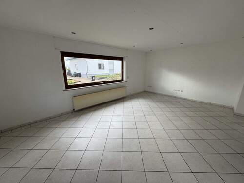 Wohnzimmer - Einfamilienhaus mit 160,00 m² in Schwalbach zum Kaufen