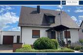 Titelbild - Gepflegtes Familiendomizil als Ein - oder Zweifamilienhaus nutzbar