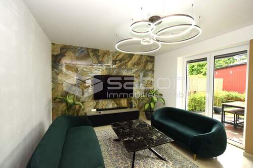 Wohnbereich - Moderne KfW-55-Doppelhaushälfte mit Erdwärmepumpe, Südgarten und Garage in Hamburg-Poppenbüttel